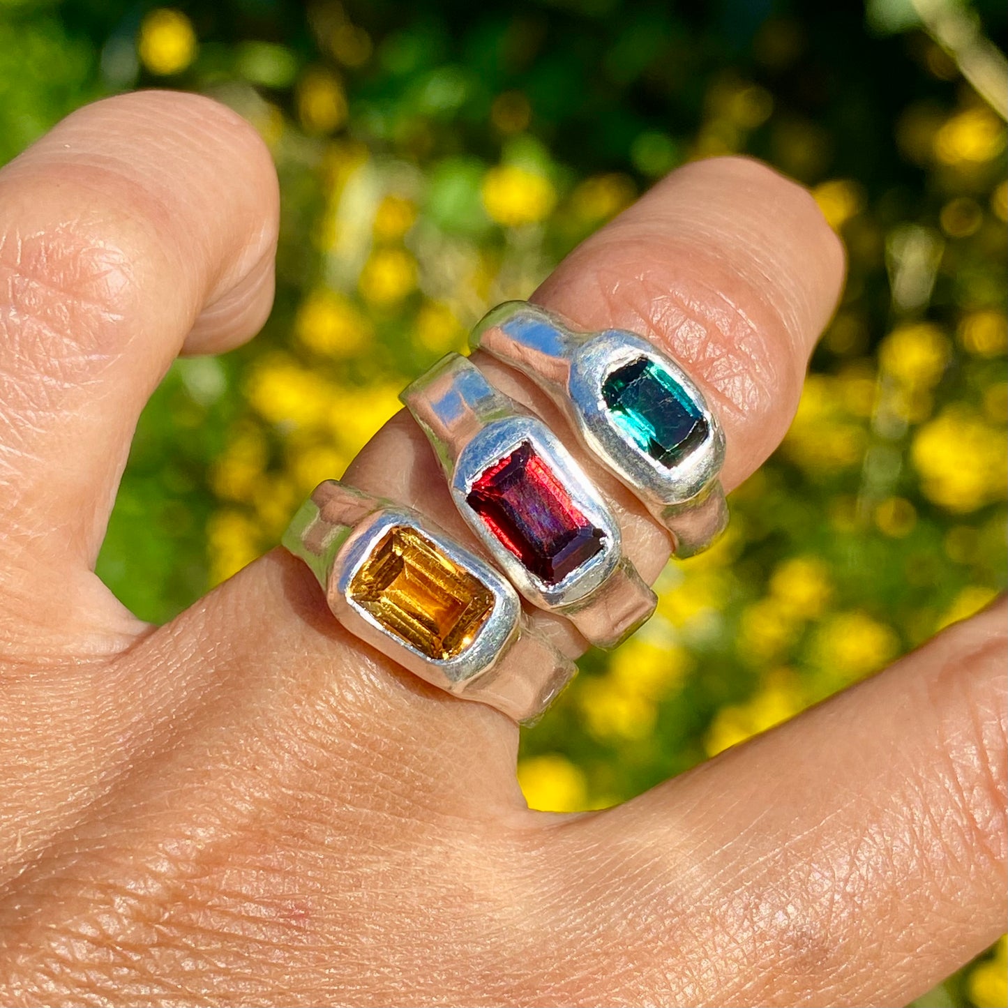 Garnet Pinky Ring features a rich red garnet stone set on a delicate band. Handmade by me in sterling silver, this ring is available in size M (US 6).