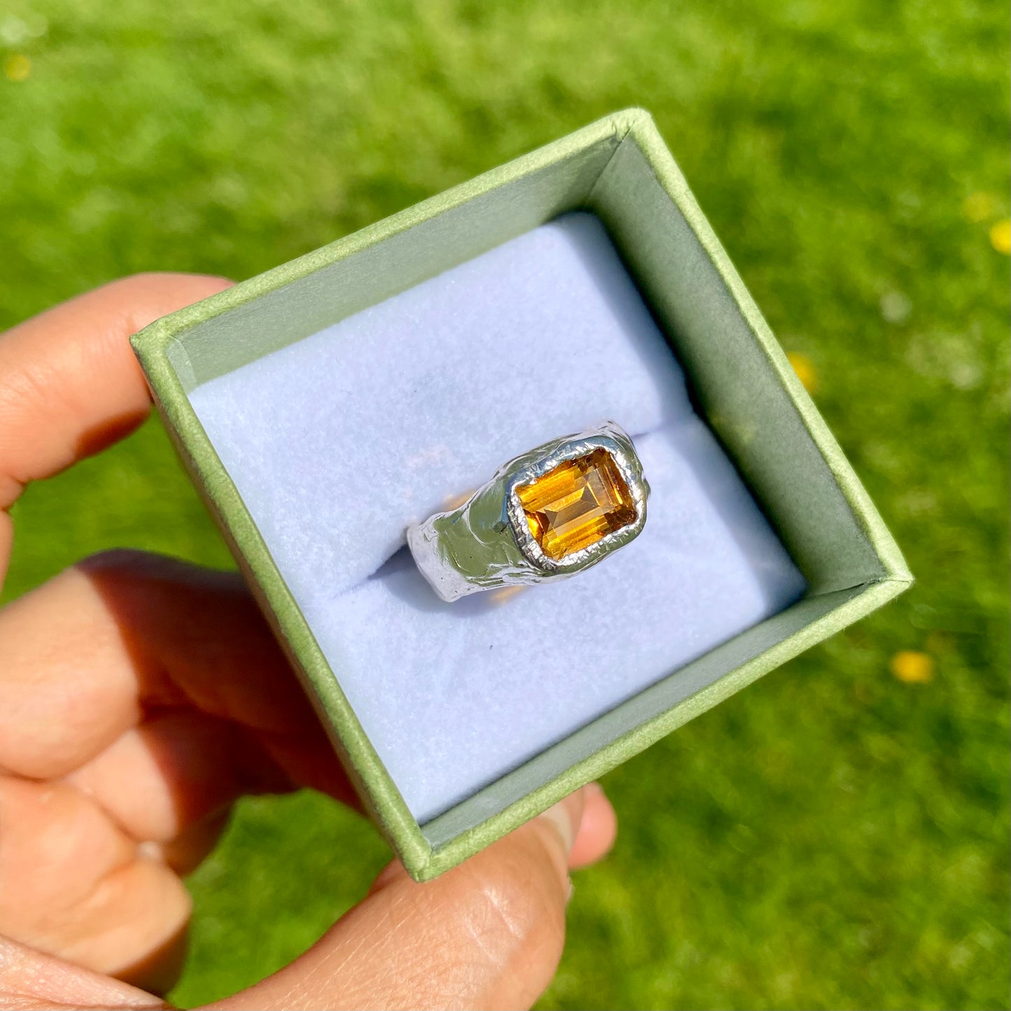 Detailed view of the Grand Sunshine Ring with yellow citrine, showcasing its sparkling beauty, size N½