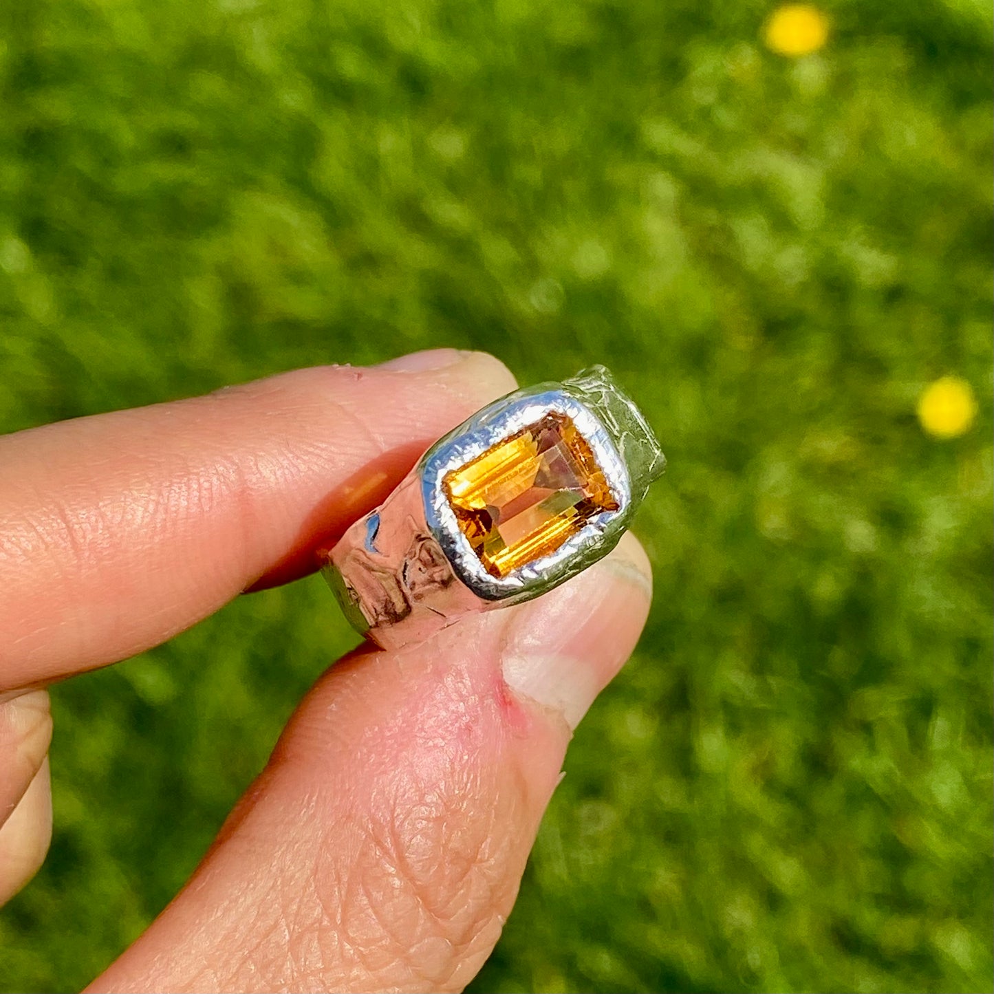 Detailed view of the Grand Sunshine Ring with yellow citrine, showcasing its sparkling beauty, size N½