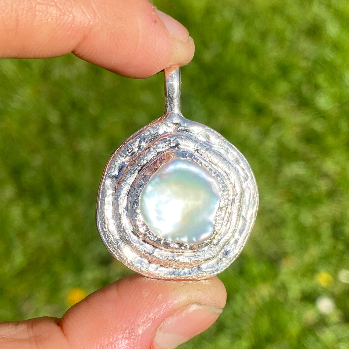 Mimpi Pendant Two in picture. Handmade by Lia in Paris.