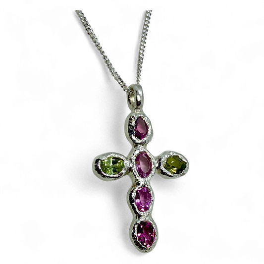 Harmony Pink Cross pendant on a 42 cm sterling silver chain, featuring pink and green tourmalines, handmade in Paris.