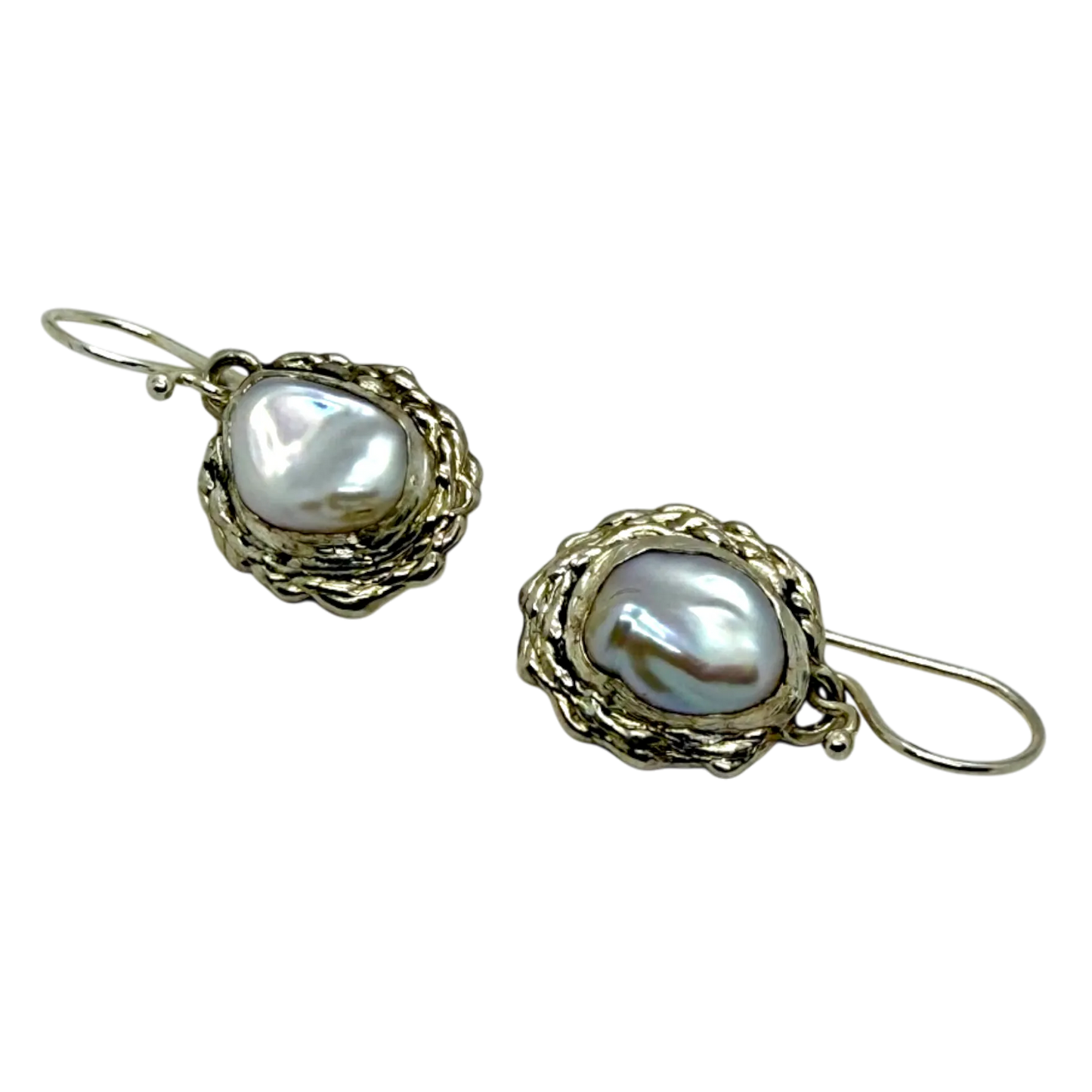 Side view of Bulan Dangles showing curved silver form and soft white pearl shine — handcrafted by Lia Makes Jewellery.
