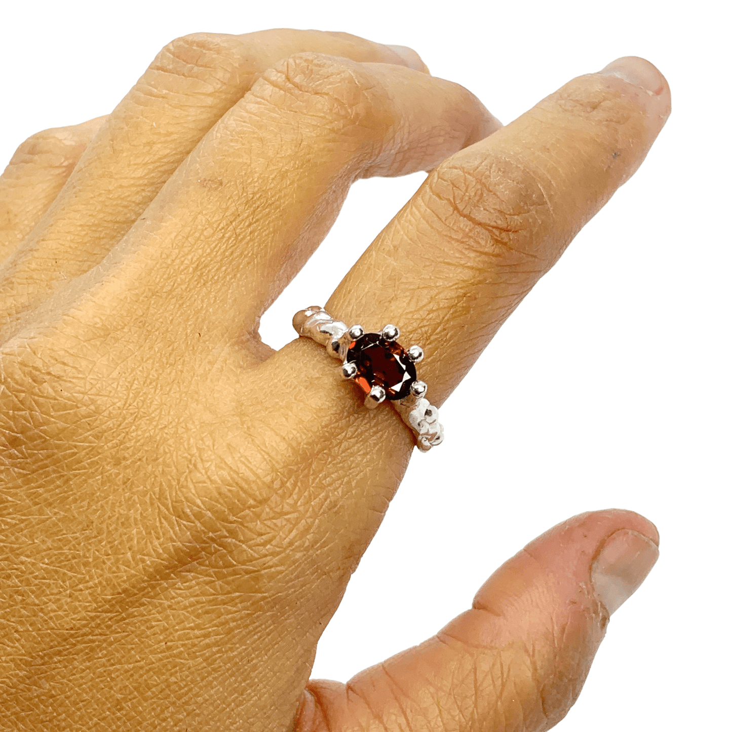 Sterling silver Gelora Ring with red garnet, size M 1/2 (US 6 1/4) shown in my finger. Handmade by Lia in Paris.