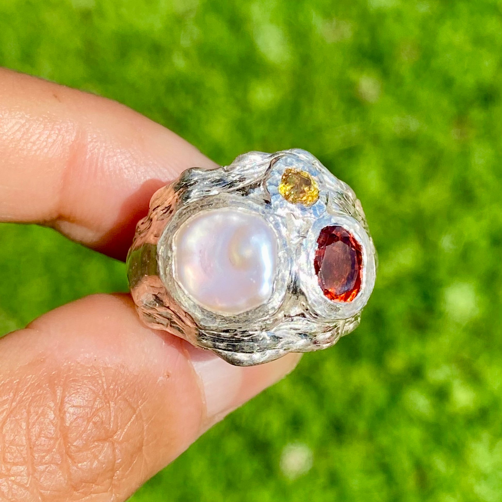The Autumn Glow; features a thick band with three stones: Keshi pearl, orange citrine, and yellow sapphire. Handmade by me, this ring is available in size P (US 7 1/2)