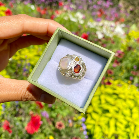 The Autumn Glow; features a thick band with three stones: Keshi pearl, orange citrine, and yellow sapphire. Handmade by me, this ring is available in size P (US 7 1/2)