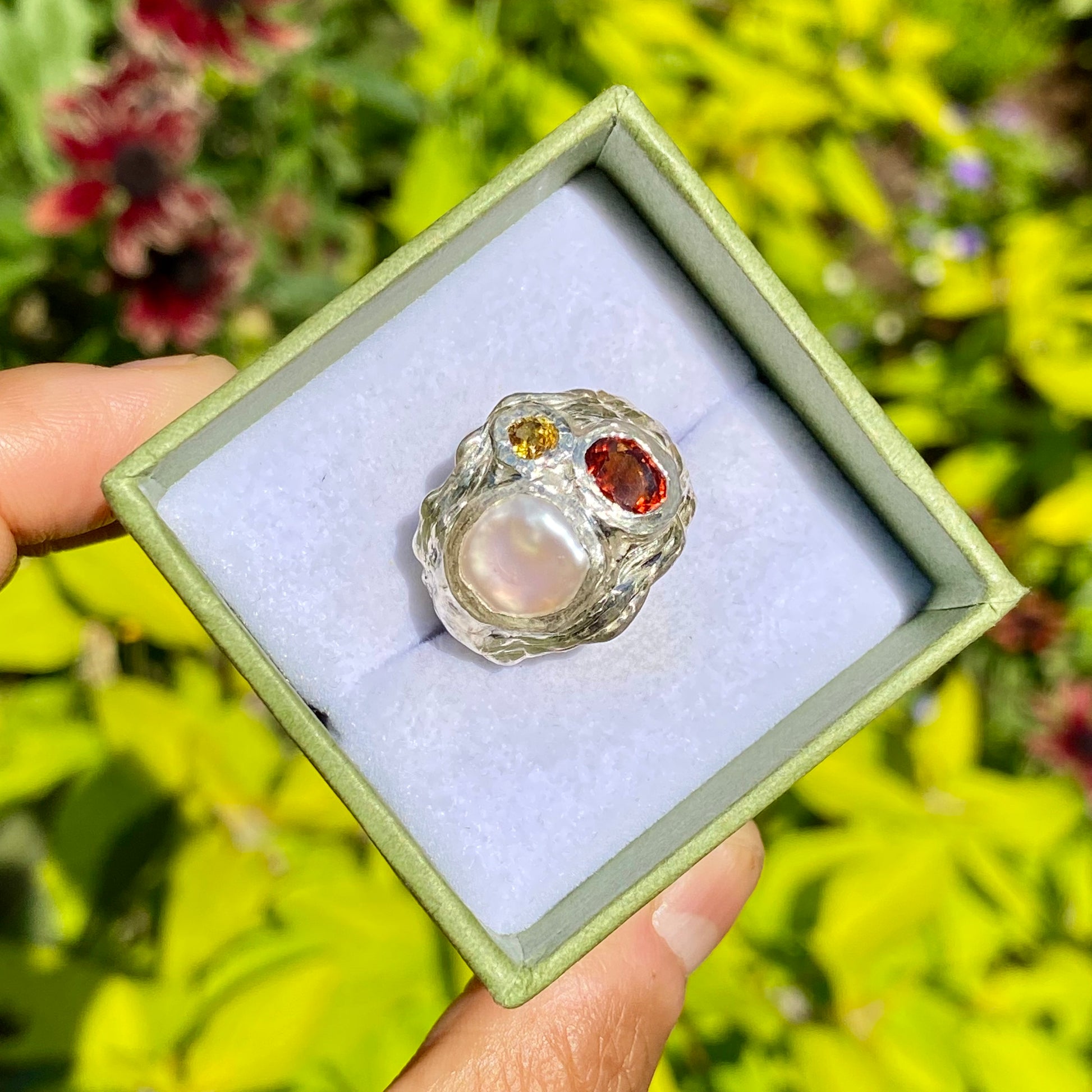 The Autumn Glow; features a thick band with three stones: Keshi pearl, orange citrine, and yellow sapphire. Handmade by me, this ring is available in size P (US 7 1/2)