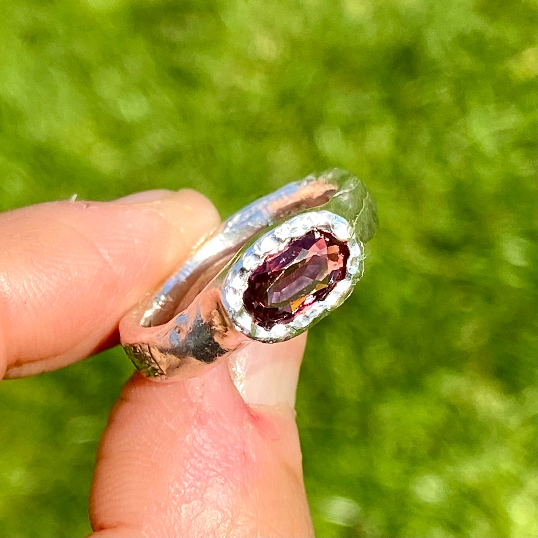 Double Harmony Rings come in a set of two. One ring features a pink tourmaline stone, and the other features three small pearl stones. Handmade from sterling silver, these stacking rings come in a single size: O ½ (or 7 ¼).
