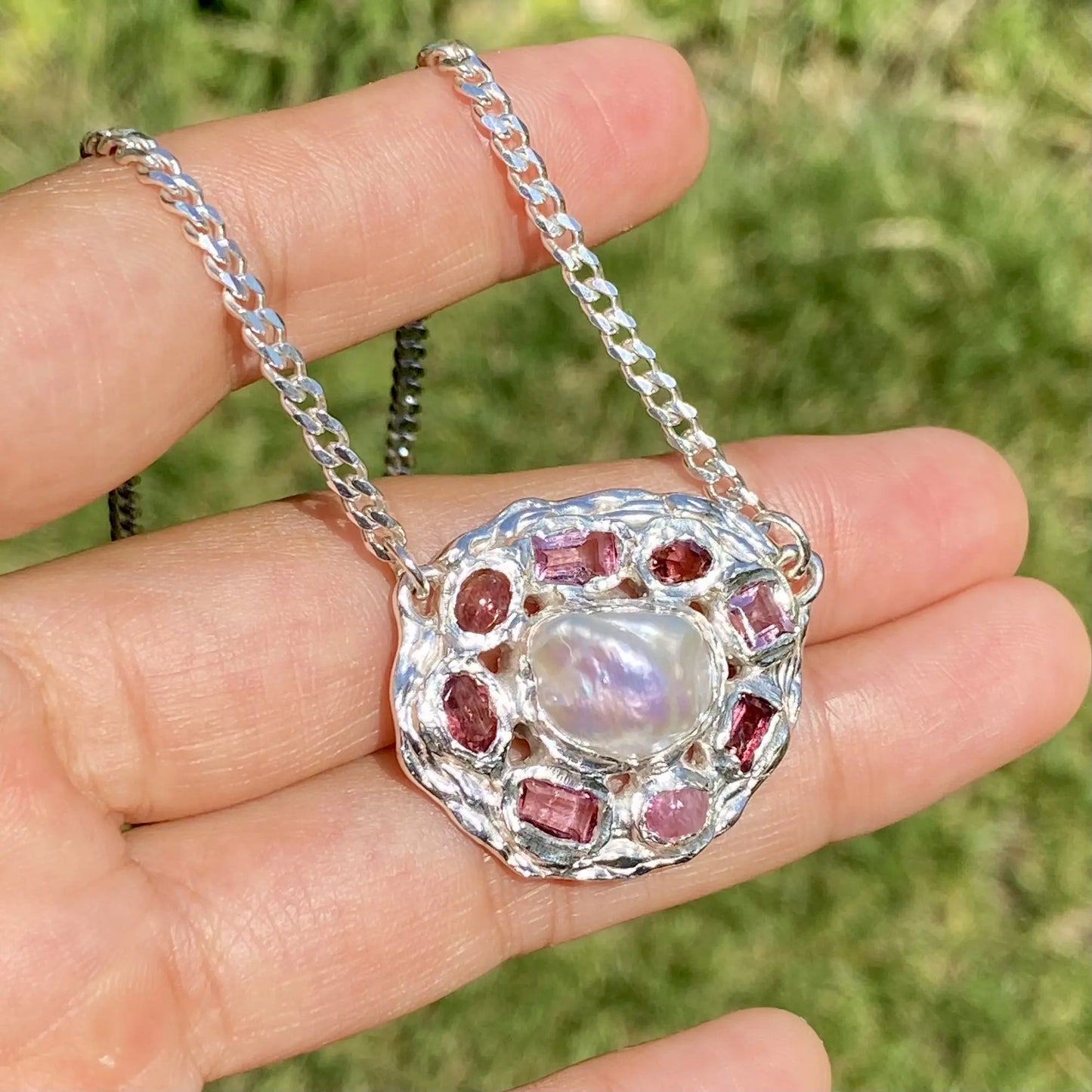 Inner bloom pendant on hand display