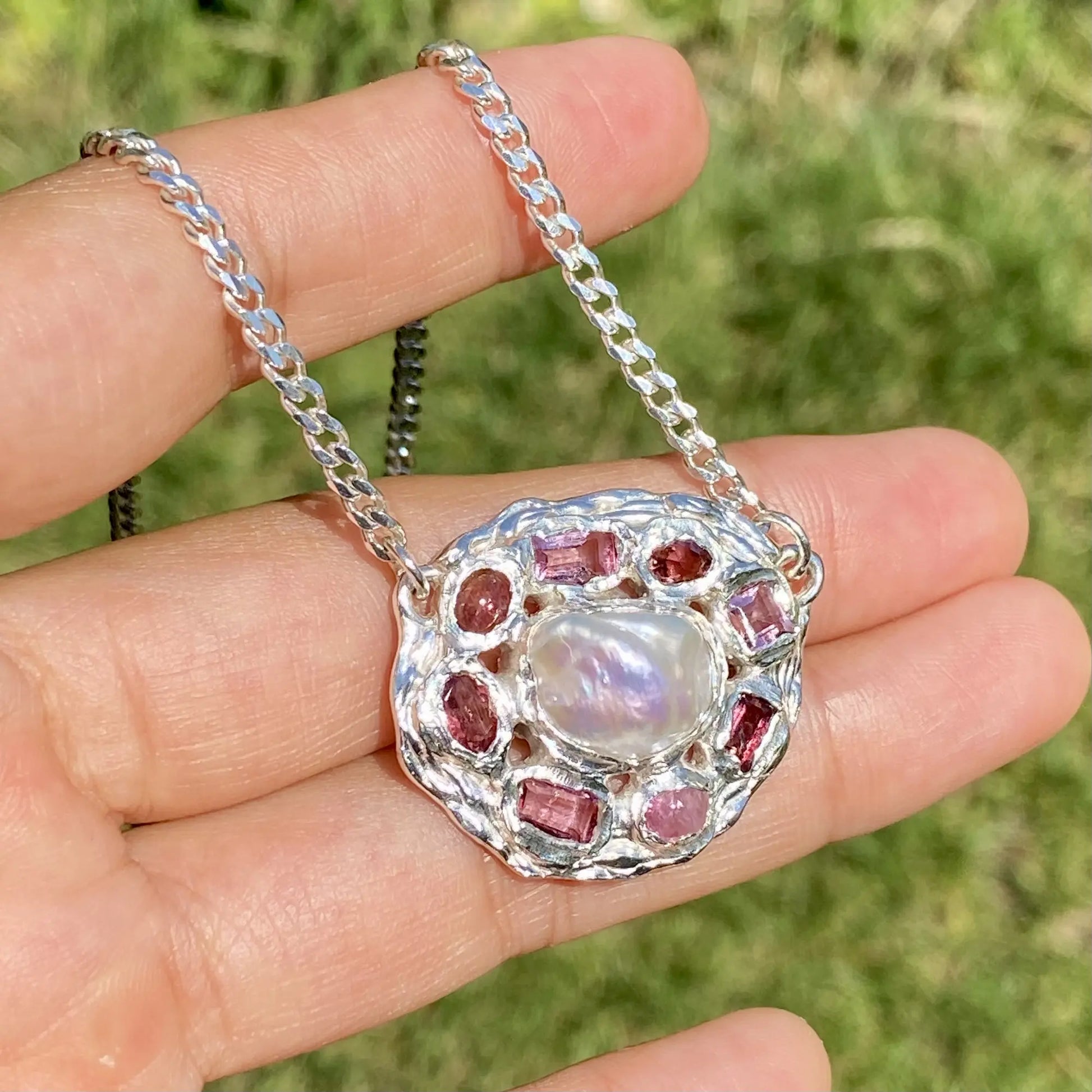 Inner bloom pendant on hand display