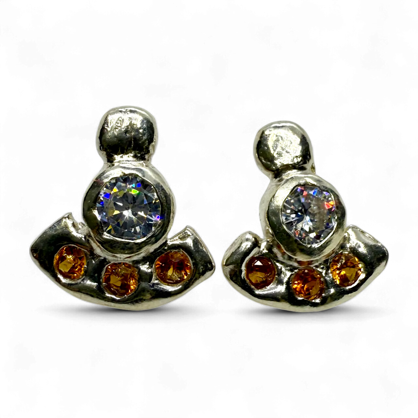 Small sterling silver orange stud earrings with synthetic gemstone sparkle, handmade in Paris.