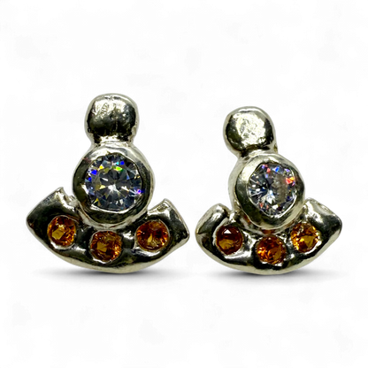 Small sterling silver orange stud earrings with synthetic gemstone sparkle, handmade in Paris.