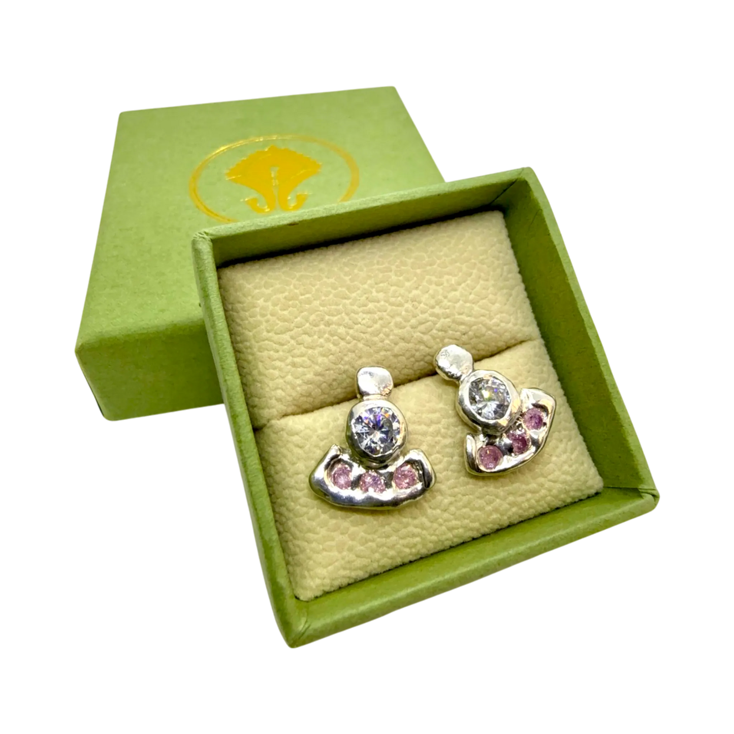 Close-up of pink Lina Stud earrings, silver setting with soft pink stones handcrafted in Paris.