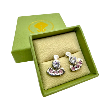 Close-up of pink Lina Stud earrings, silver setting with soft pink stones handcrafted in Paris.