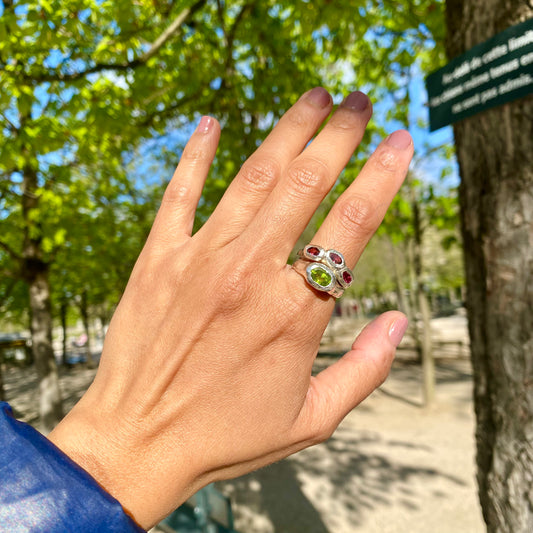 Pink Oasis Ring Stack comes as a set of two stacking rings. One ring features three pink tourmaline stones, while the other holds a green peridot. Handmade by me in sterling silver, these rings are available in size P (US 7 1/2).