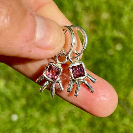 Robot Earrings feature square-cut pink tourmaline stones.  They are named Robot because they look like a robot.