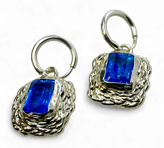 Astra Hoops handmade in Paris from sterling silver with blue topaz gemstones, crafted by Lia Makes Jewellery.