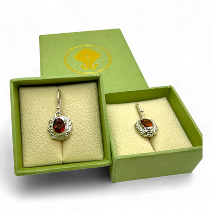 Sola Dangles presented on jewellery box — sterling silver dangle earrings with warm orange citrines.
