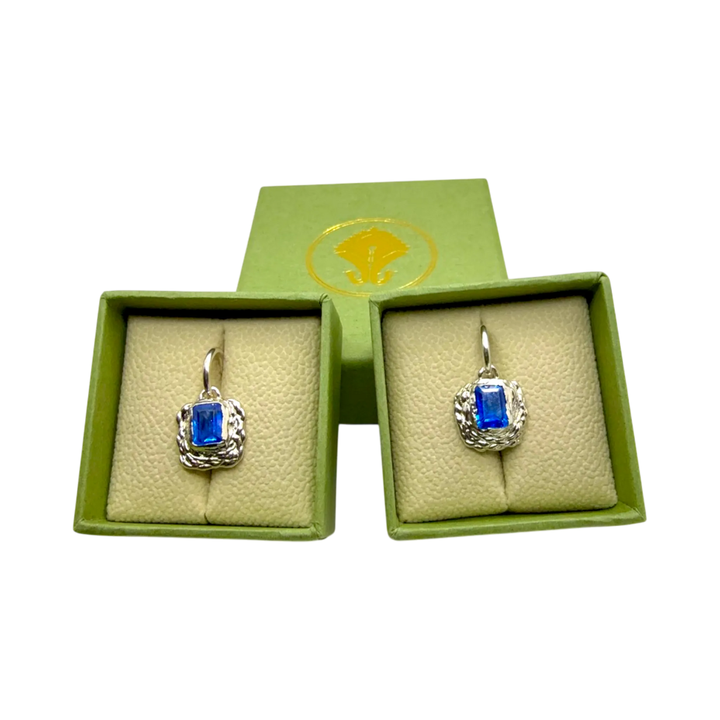 Astra Hoops presented on jewellery box — sterling silver hoop earrings with vivid blue topaz gemstones by Lia Makes Jewellery.