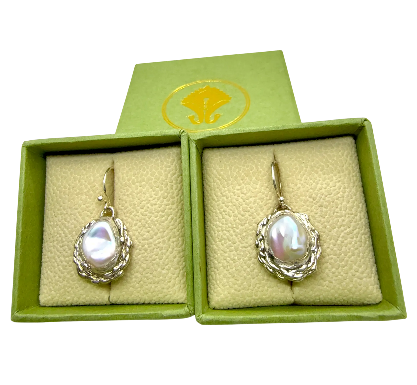 Single Bulan Dangle earring in polished sterling silver with a natural white pearl — handcrafted by Lia Makes Jewellery.