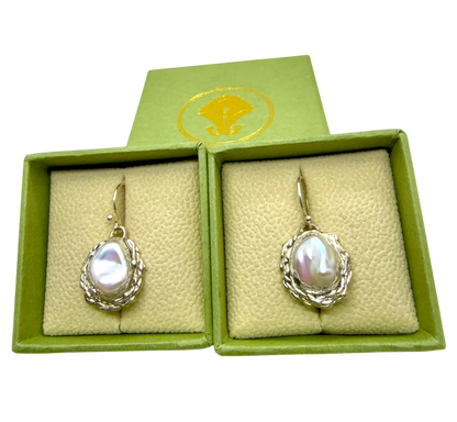 Single Bulan Dangle earring in polished sterling silver with a natural white pearl — handcrafted by Lia Makes Jewellery.