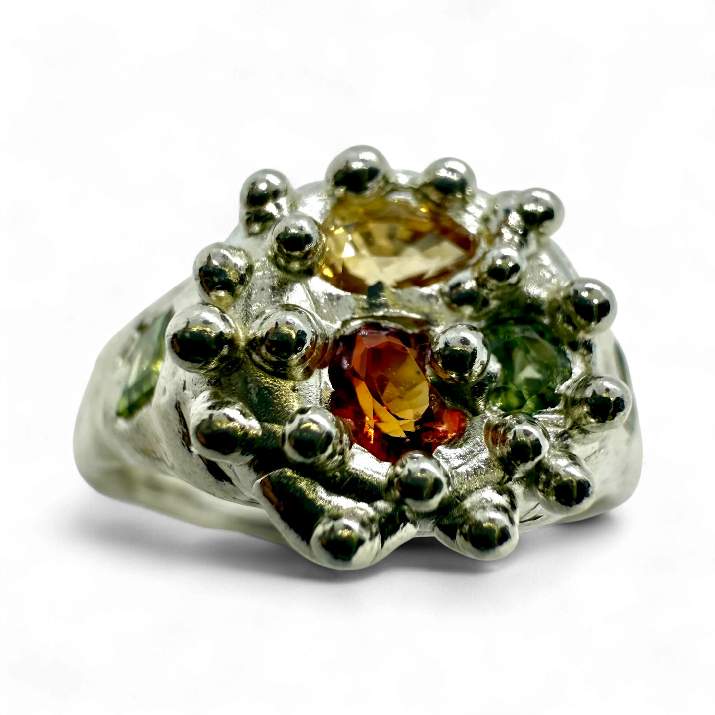 Full view of Pijar Ring — handmade sterling silver ring with yellow, green, and orange sapphires crafted by Lia Makes Jewellery.