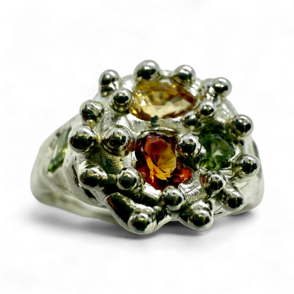 Full view of Pijar Ring — handmade sterling silver ring with yellow, green, and orange sapphires crafted by Lia Makes Jewellery.