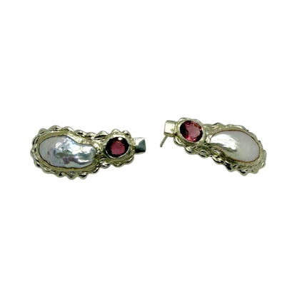 Side view of White Rosé earrings showing polished sterling silver with pink spinel and white keshi pearls.