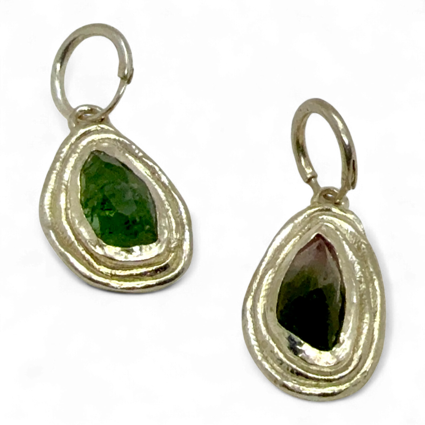 Orra Hoops handmade in Paris from sterling silver with green-pink tourmalines, crafted by Lia Makes Jewellery.