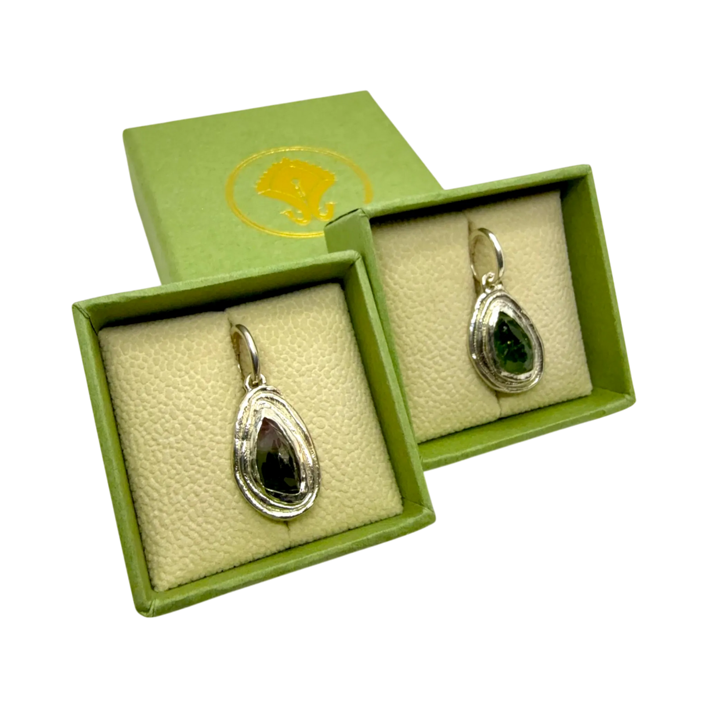 Orra Hoops on display — sterling silver hoop earrings with green-pink tourmalines handcrafted by Lia Makes Jewellery Paris.