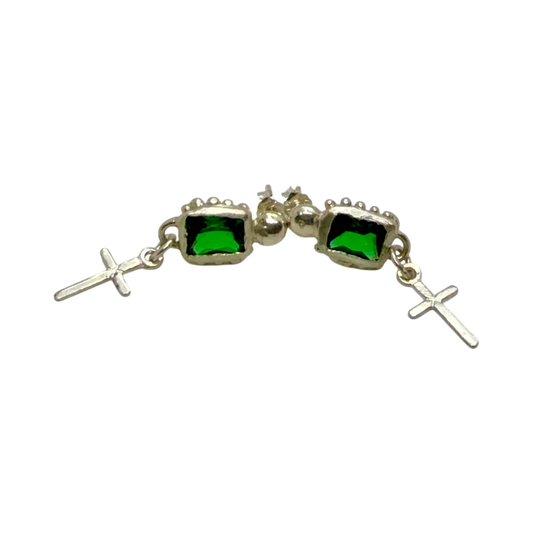 Side view of Santo Studs showing sterling silver setting and vivid green synthetic emeralds.