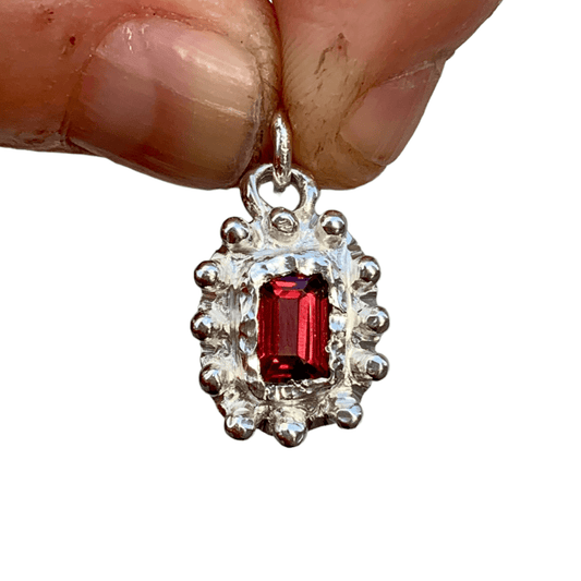 Sterling silver Bola Bola Pendant with red tourmaline, 42 cm chain. Handmade by Lia in Paris.