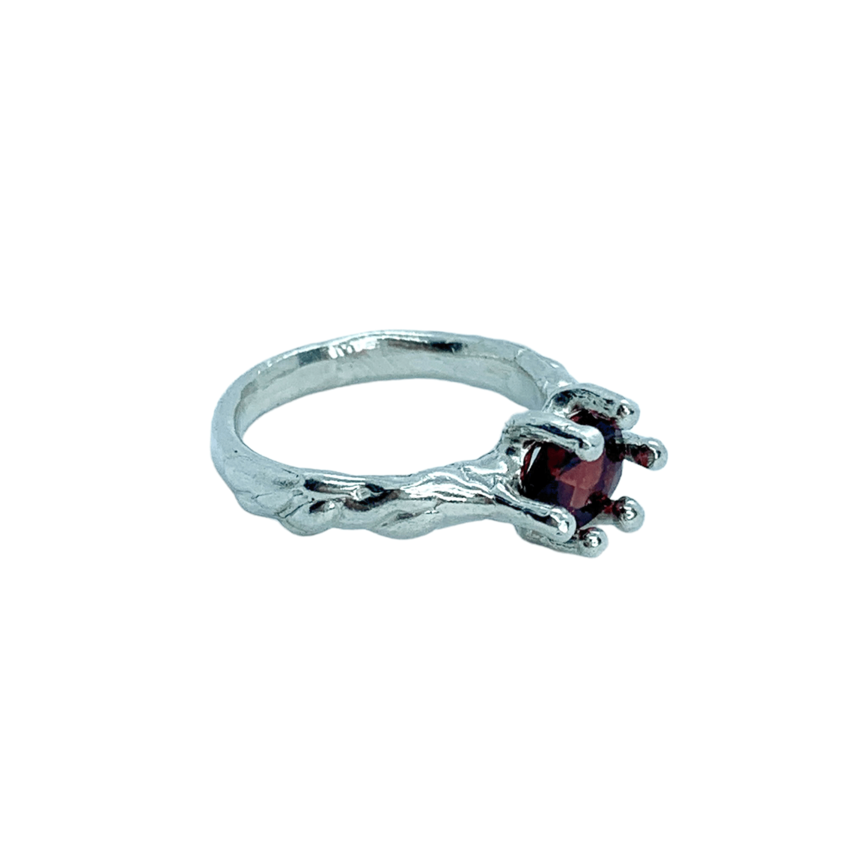 Sterling silver Gelora Ring with red garnet, size M 1/2 (US 6 1/4) with white background. Handmade by Lia in Paris.
