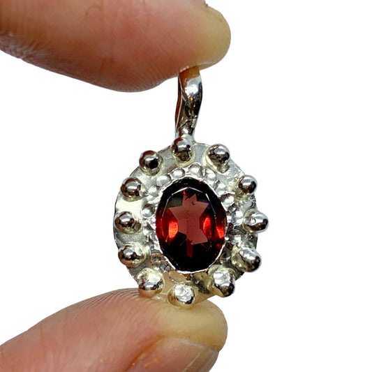 The Merah pendant, which is bahasa indonesia for red is made of sterling silver and features a red garnet stone. It comes with a 42cm silver chain. 