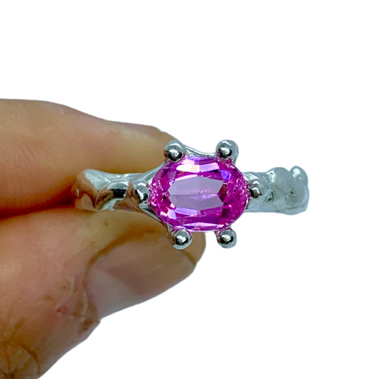 Meaning "Pink" in Indonesian, the Merah jambu ring is crafted with sterling silver and features a pink cubic zirconia secured by silver claws. Available in size N 1/2 or 6 3/4.