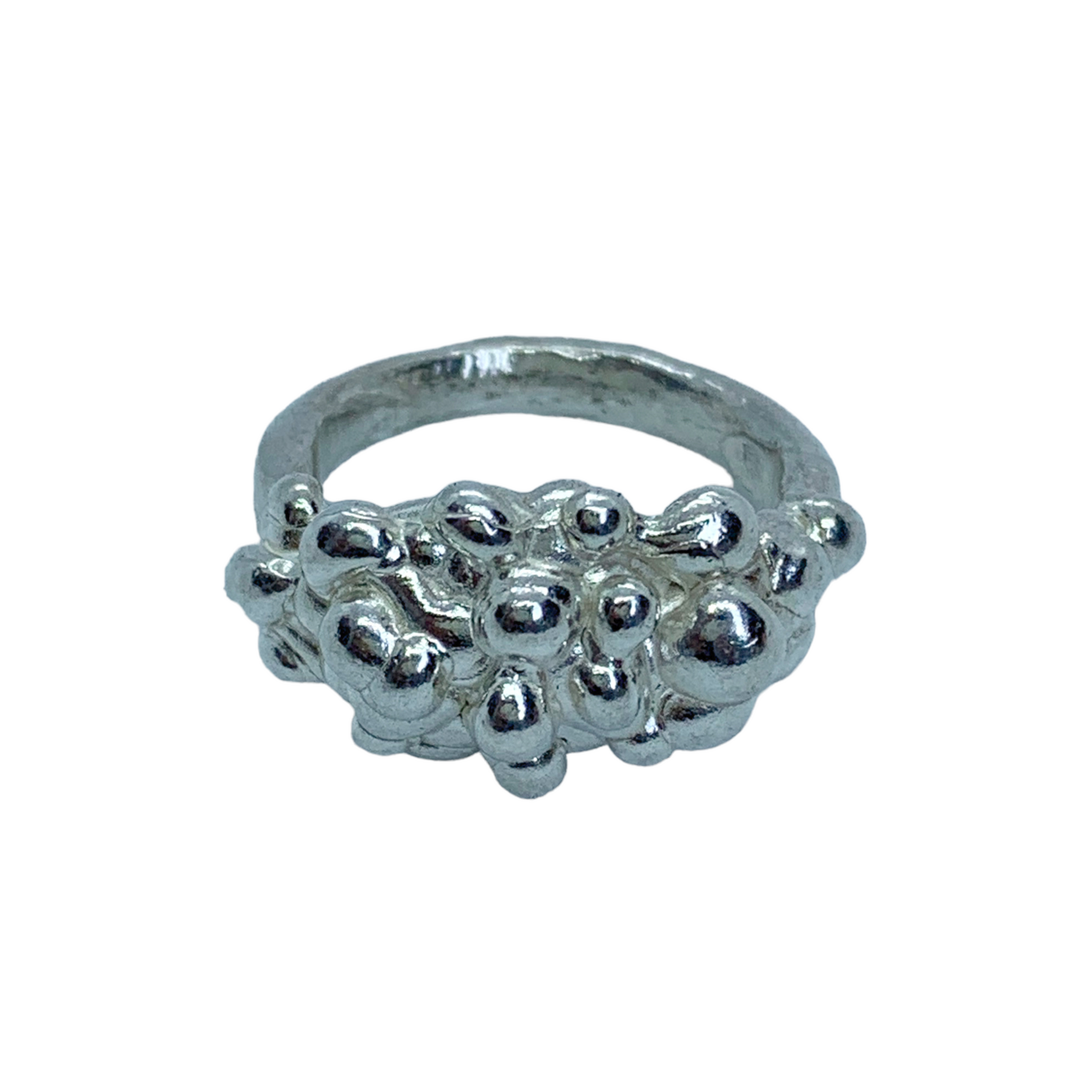 Introducing the Bubbly Ring, a unique and playful design that resembles a cluster of bubbles coming together in one silver ring. Perfect for adding a touch of fun and quirkiness to your everyday look.