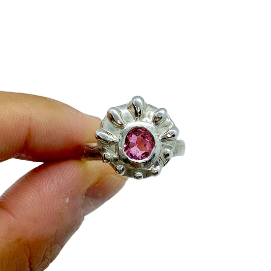 Silver Raffles Ring with pink spinel and textured band, handmade by Lia. White background. Available in sizes L and M ½.