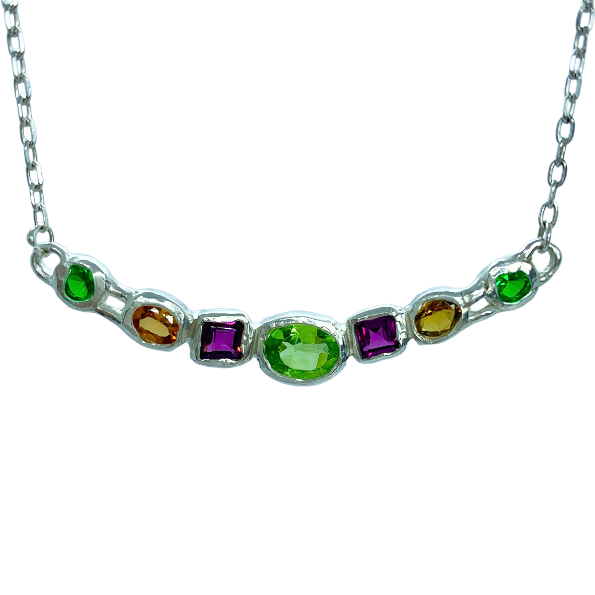Warna-Warni Necklace comes with several colours. The main middle stone is Green Peridot. The rest of the stone are purple tourmalines, yellow tourmalines, and synthetic stones for the green. Warna-warni pendant is for everyday wear. 