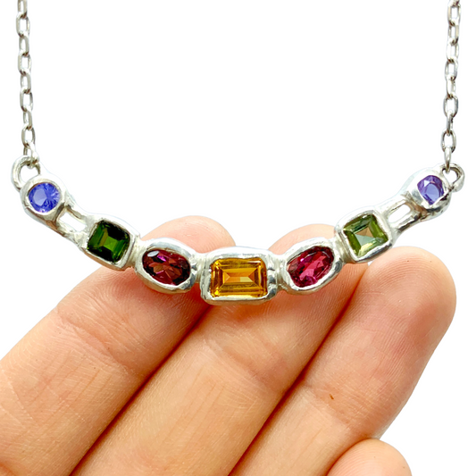 Warna-Warni is Bahasa Indonesia for colourful. Warna-warni twin necklace is an adjustable necklace with 7cm extension chain. Total of the length is 42cm. Stones: Yellow citrine, red tourmalines, green tourmalines, and purple synthetic stones. 